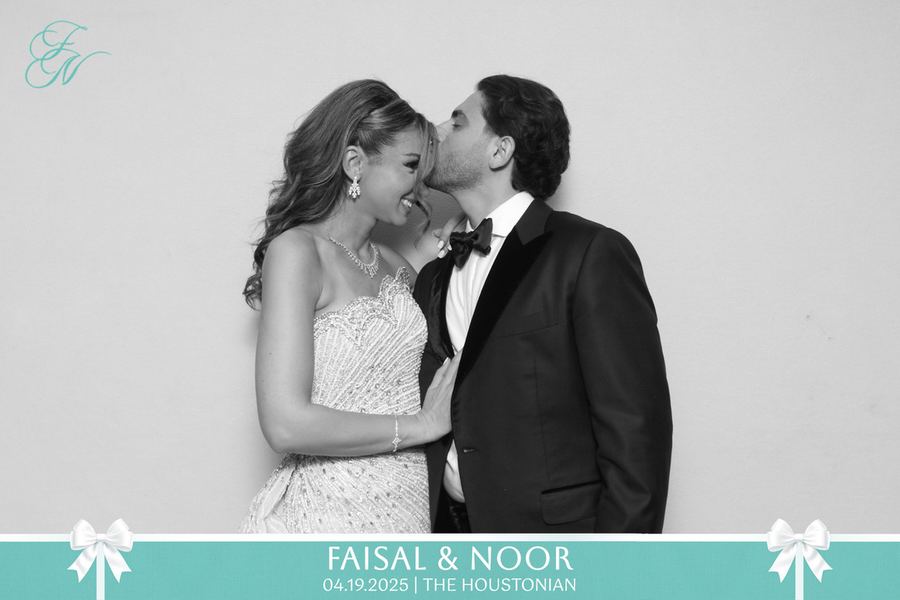 A bride and groom photographed at their wedding, with a custom overlay carrying the couple&rsquo;s names and date.